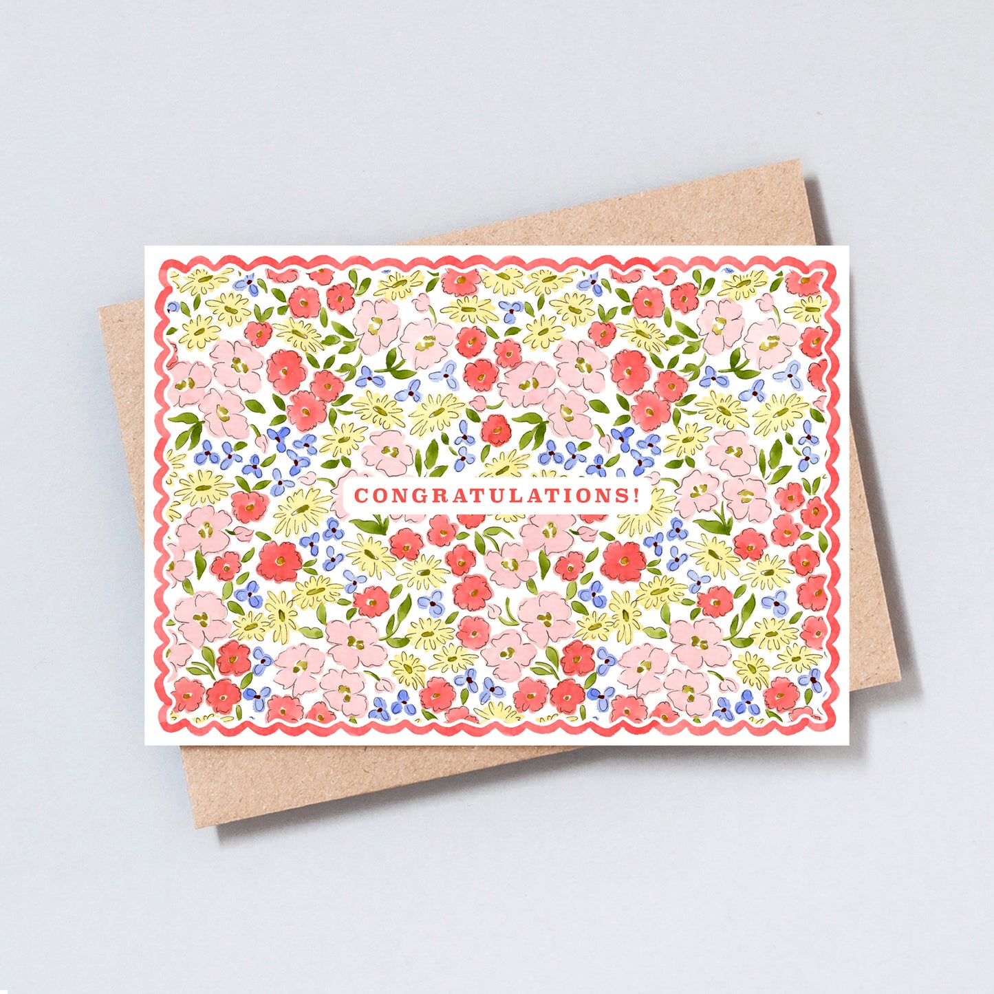 Floral congratulations card with colourful botanical pattern and scalloped border