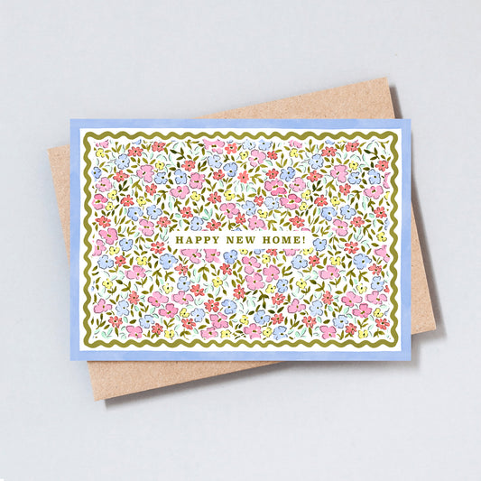 Floral new home card with detailed border illustration on textured cardstock