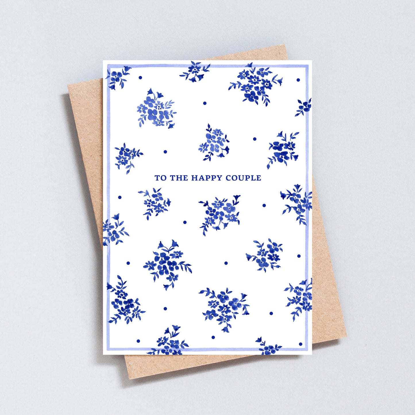 Elegant blue floral wedding card with minimal design and happy couple text