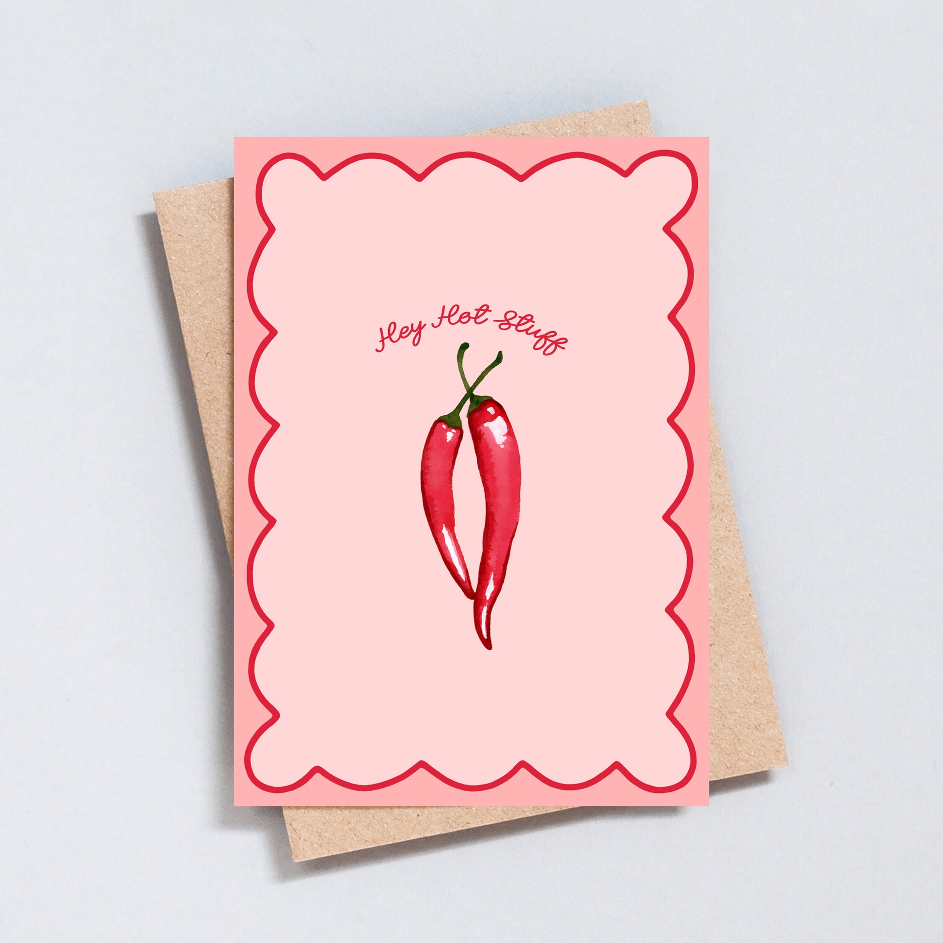 Funny “Hey Hot Stuff” card with two red chillies on a pink scalloped background.