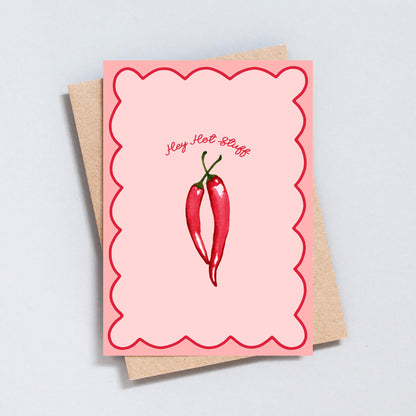 Funny “Hey Hot Stuff” card with two red chillies on a pink scalloped background.