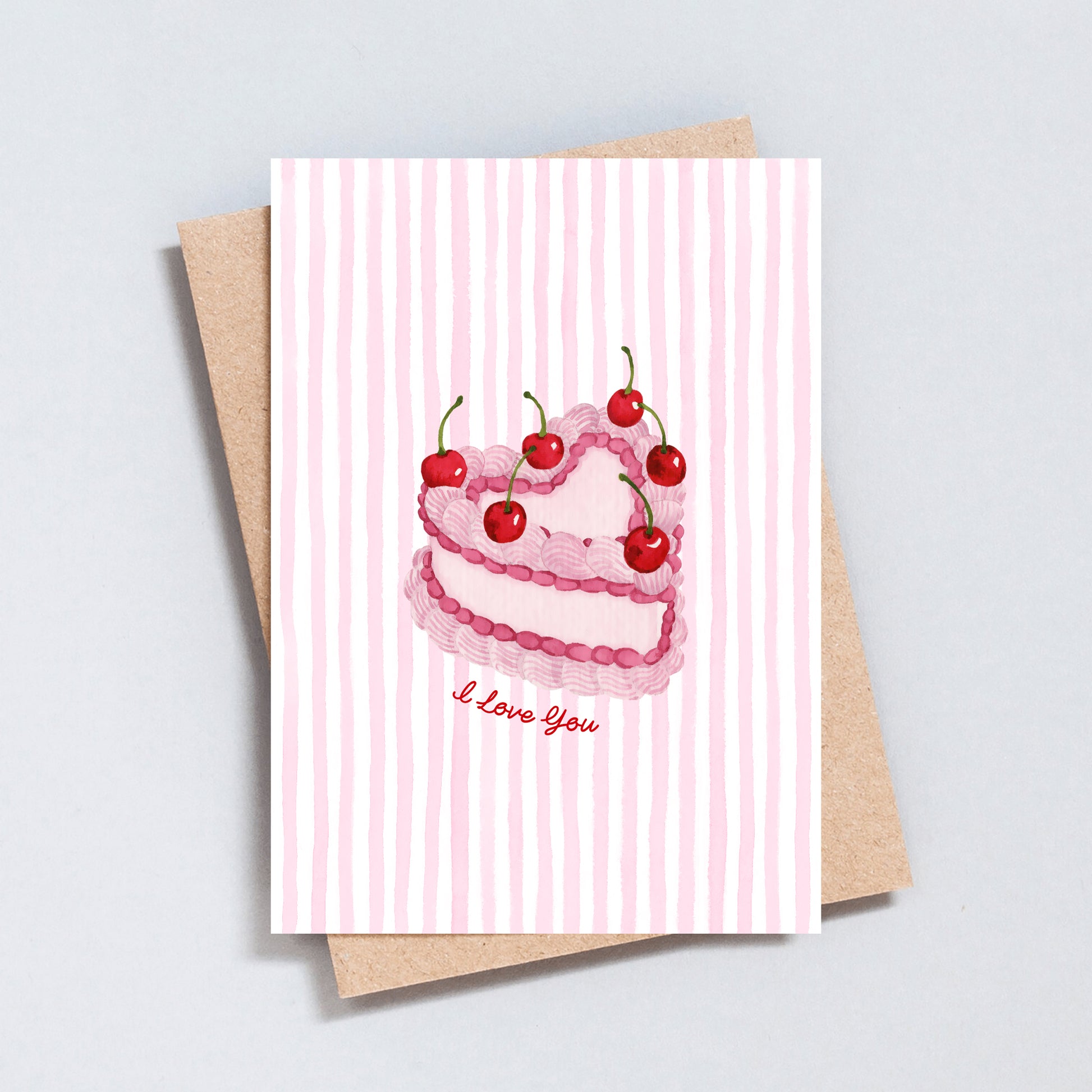 Pink vintage cherry cake card with “I Love You” text on pink striped background.