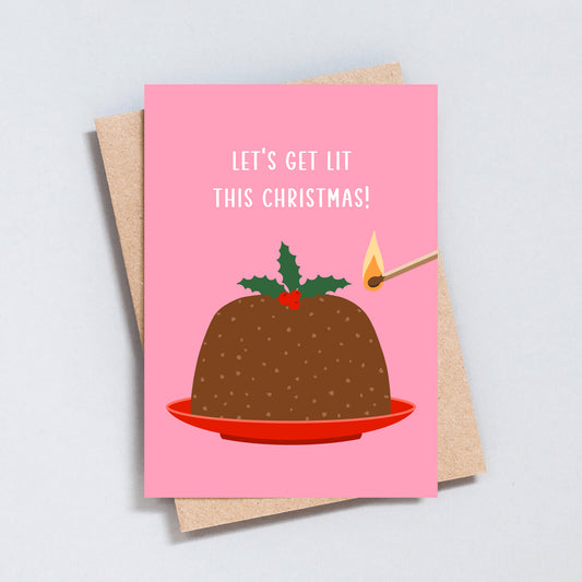 Pink Christmas card with illustrated pudding and match featuring the phrase “Let’s Get Lit This Christmas”